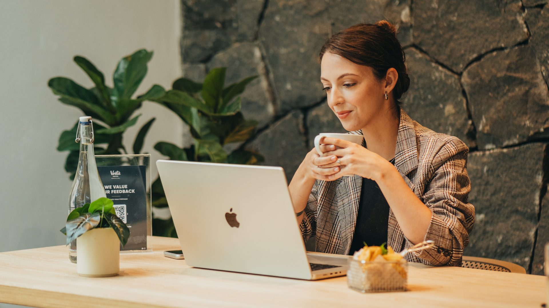 Digital nomad working online with hotel Wi-Fi