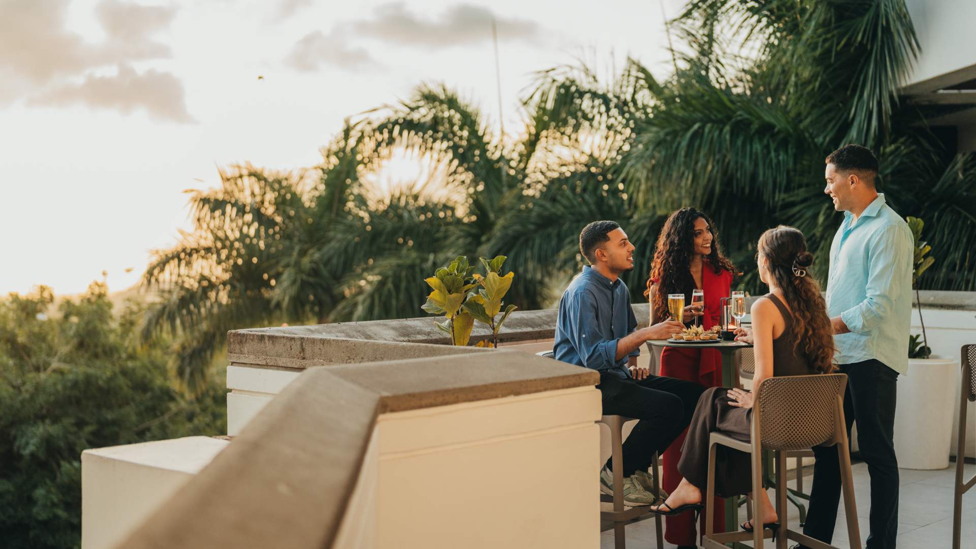 Guests enjoying lunch on the rooftop terrace at Voilà Hotel in Mauritius