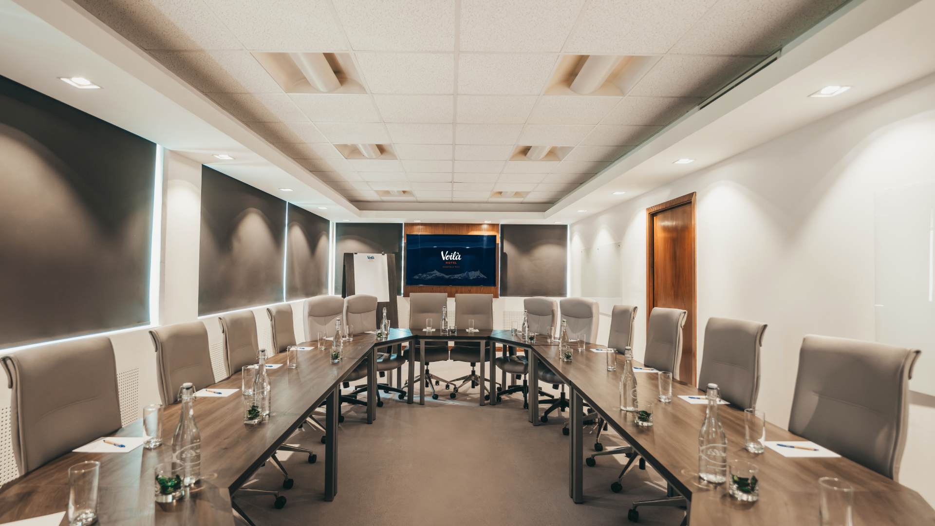 Business professionals meeting in the Accelerator Room at Voilà Hote